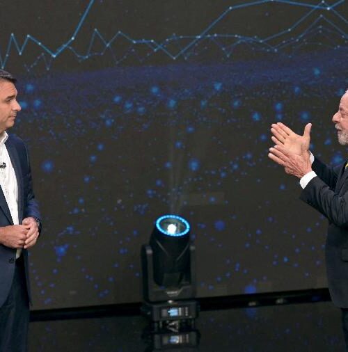 Lula e Flávio Bolsonaro trocam acusações e apresentam propostas em debate na Band